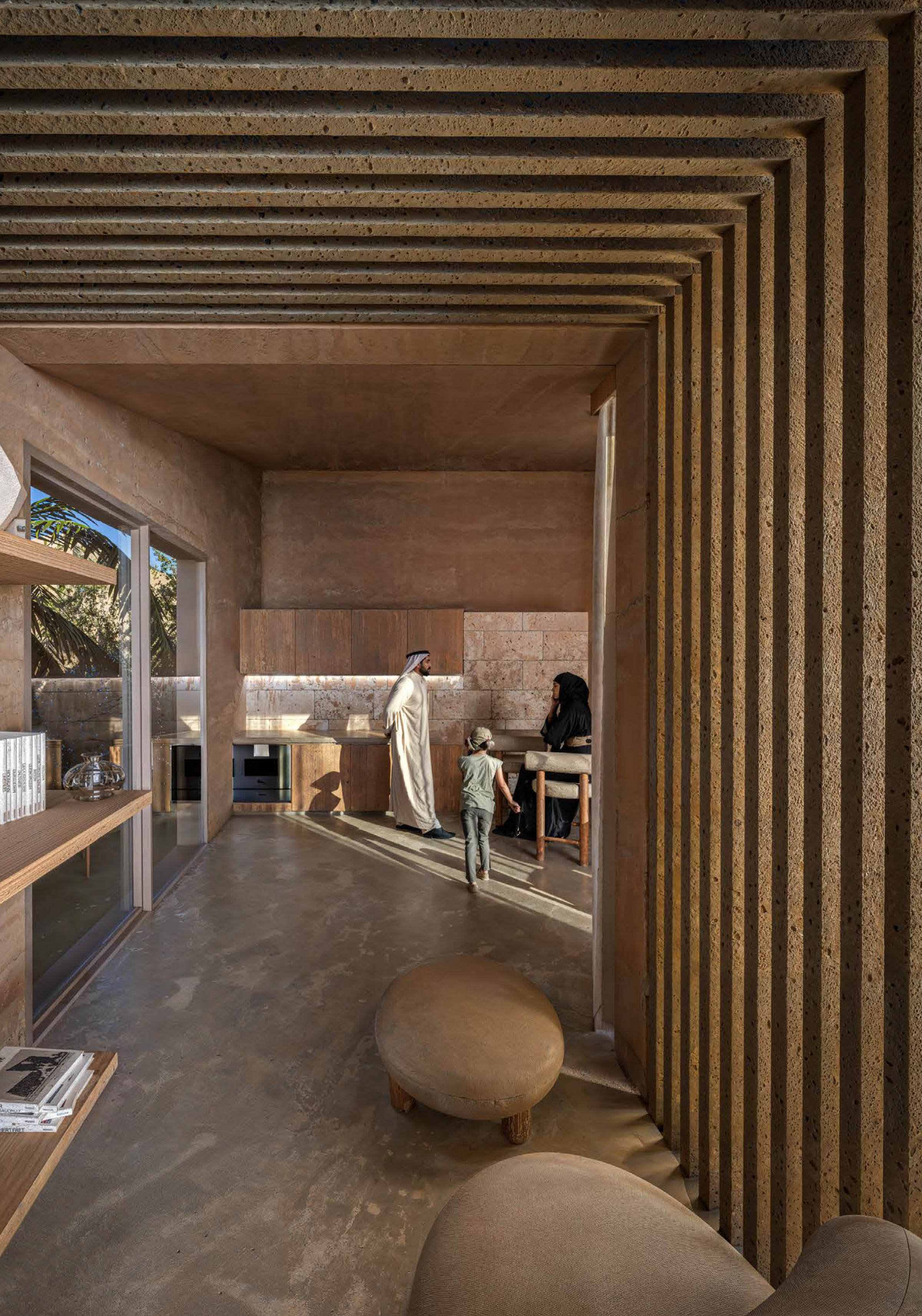 The ribbed timber ceiling of the living space opening onto the courtyard