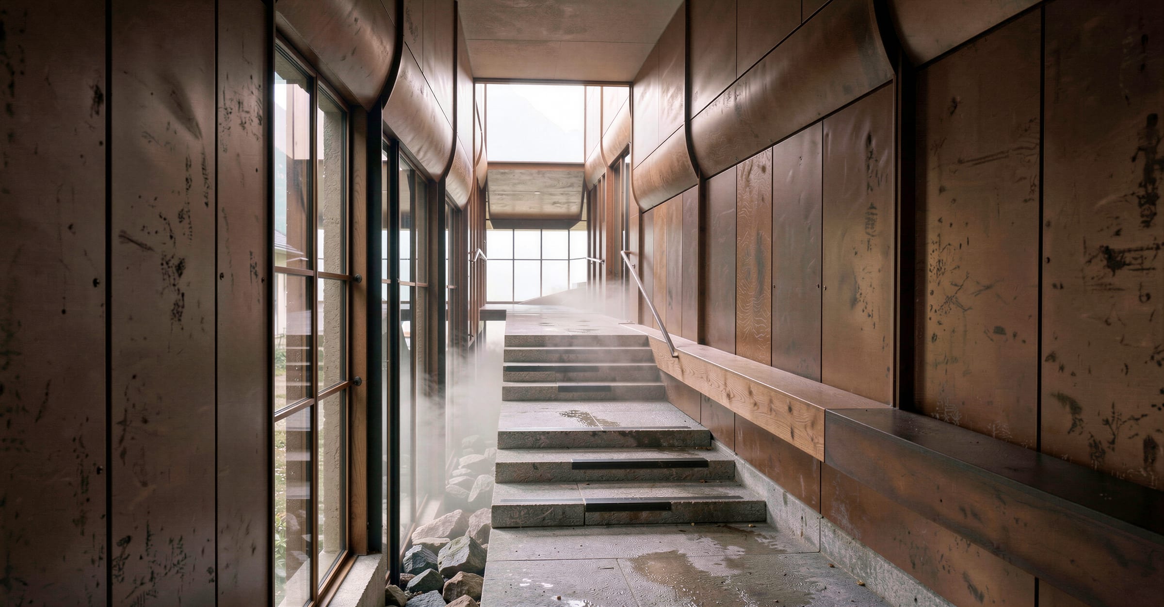 Steps climbing through a copper-clad passage, steam drifting in from the glazing